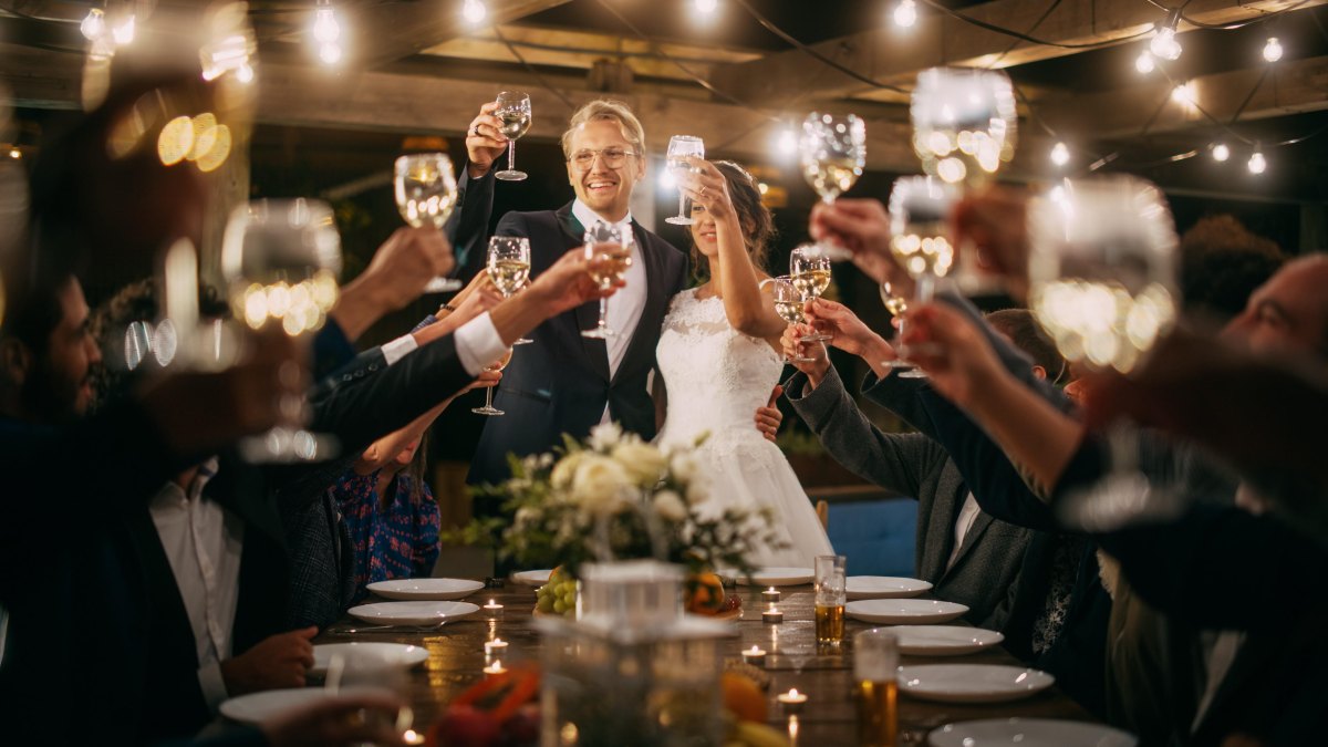 wedding toast raising glasses celebration