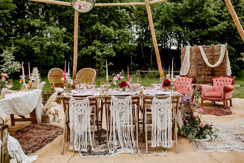Bohemian garden reception with macrame decor