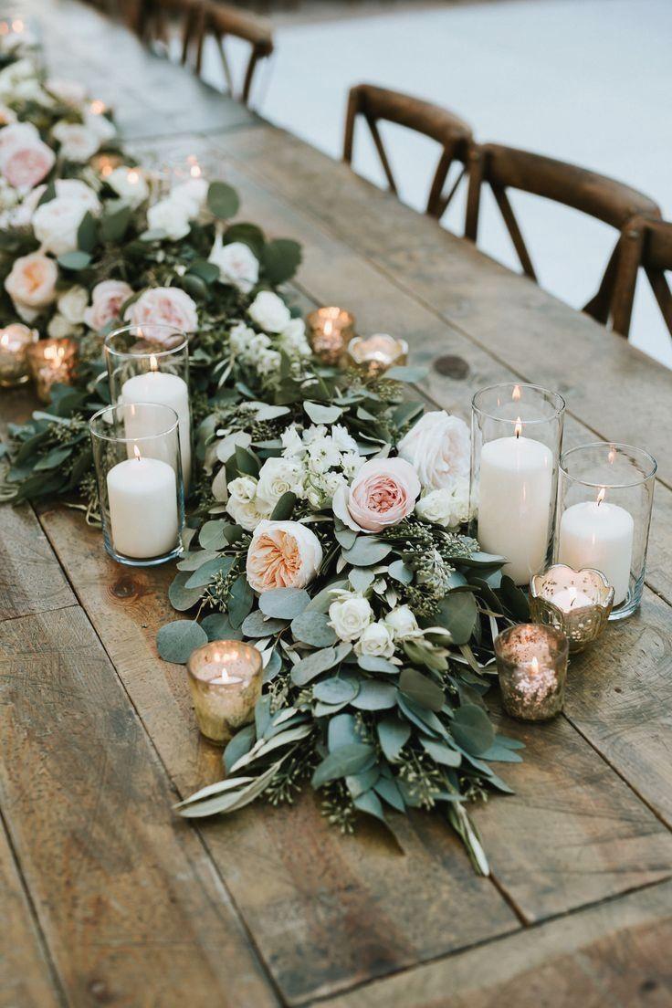Farmhouse table glowing with candles