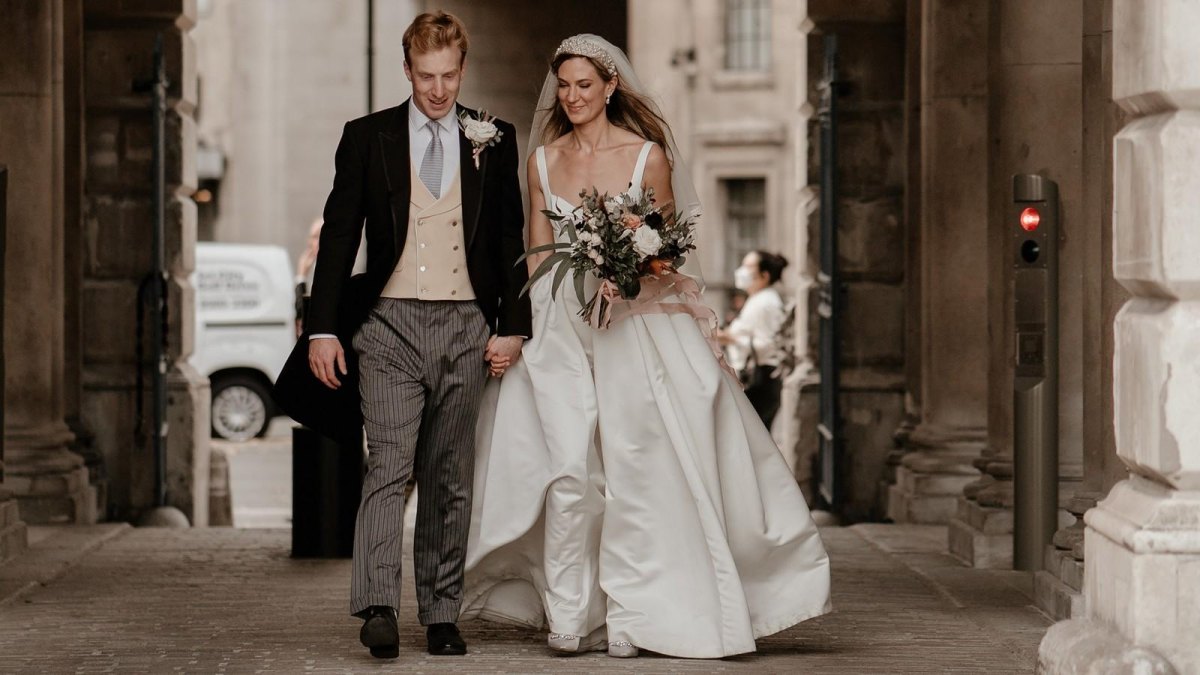 Elegant wedding couple walking