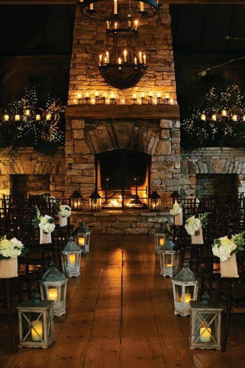 Cozy fireplace winter wedding backdrop