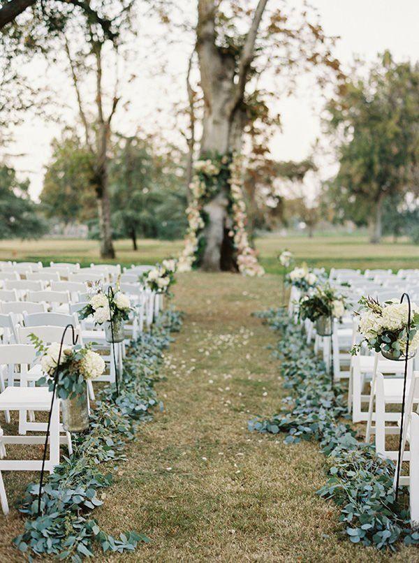 DIY decorated backyard wedding aisle