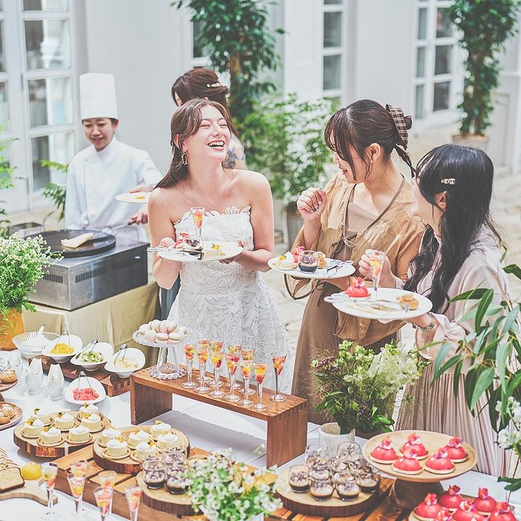 Wedding guests enjoying a DIY food station
