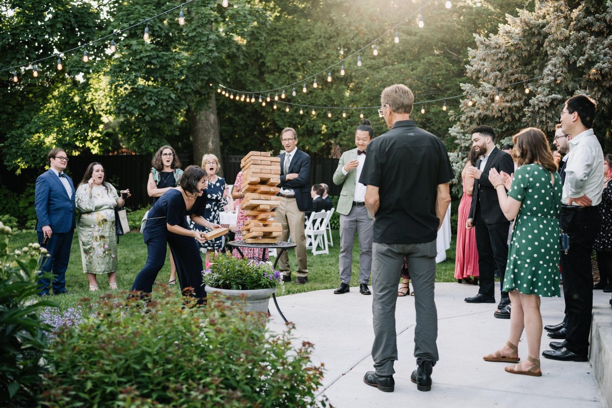 Giant Jenga game at outdoor wedding