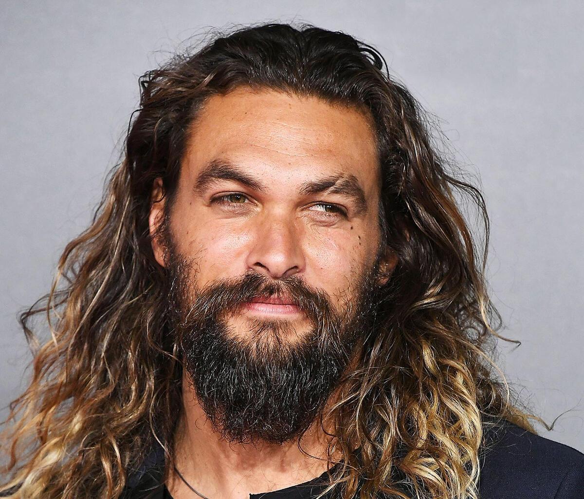 Jason Momoa wearing a relaxed textured outfit