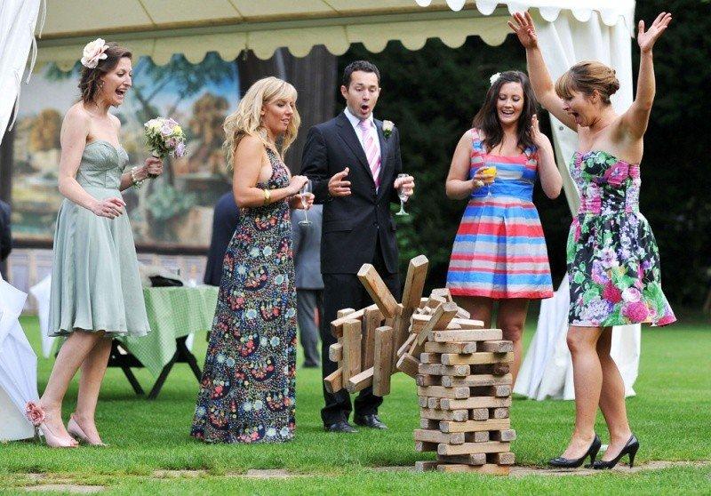 Guests enjoying outdoor wedding entertainment activities