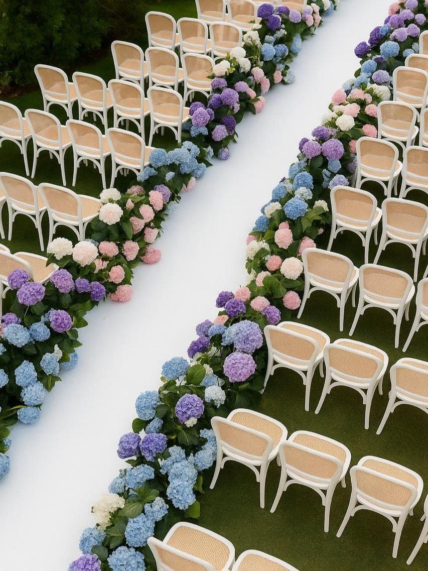 Pastel hydrangea aisle flower arrangements