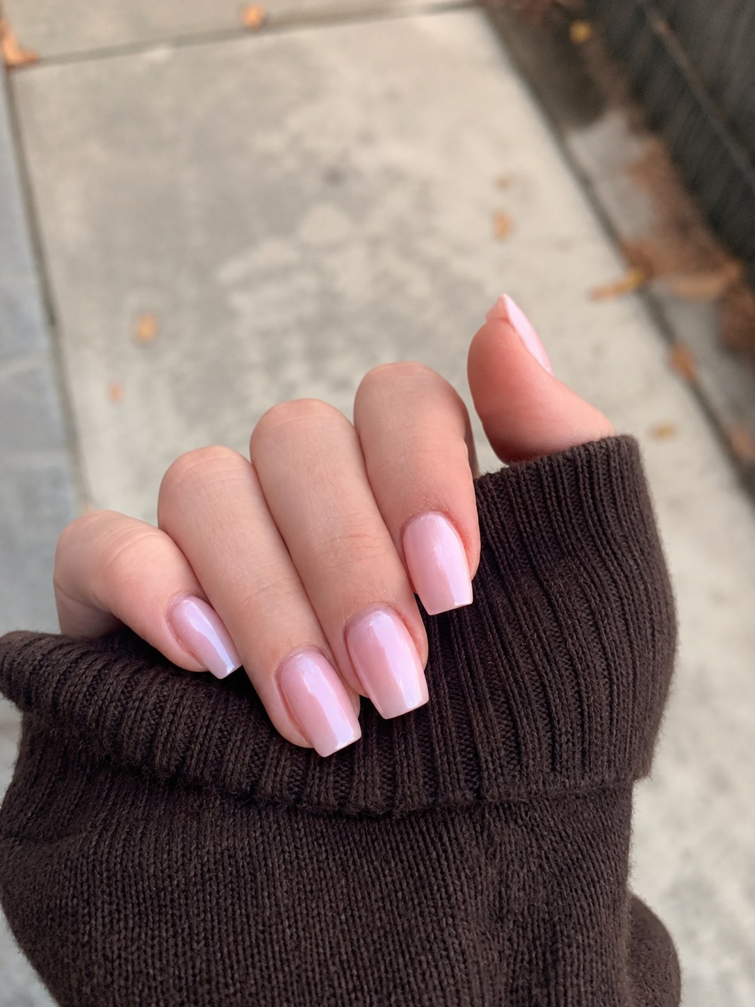 Medium square nails painted in a shimmering iridescent lilac-pink shade