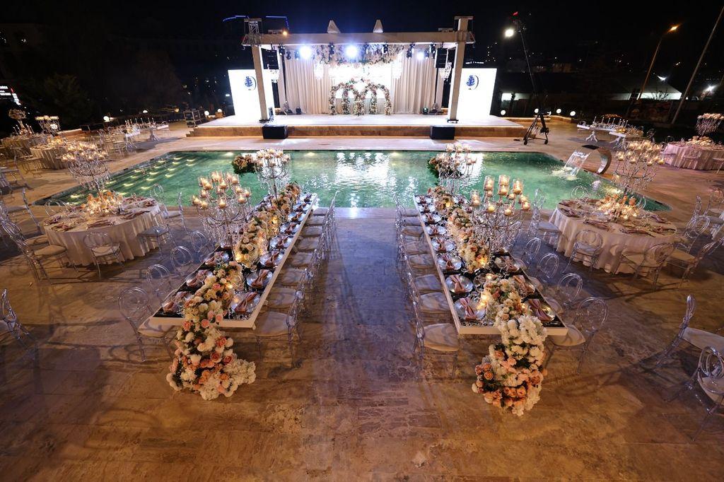 Elegant poolside backyard wedding reception