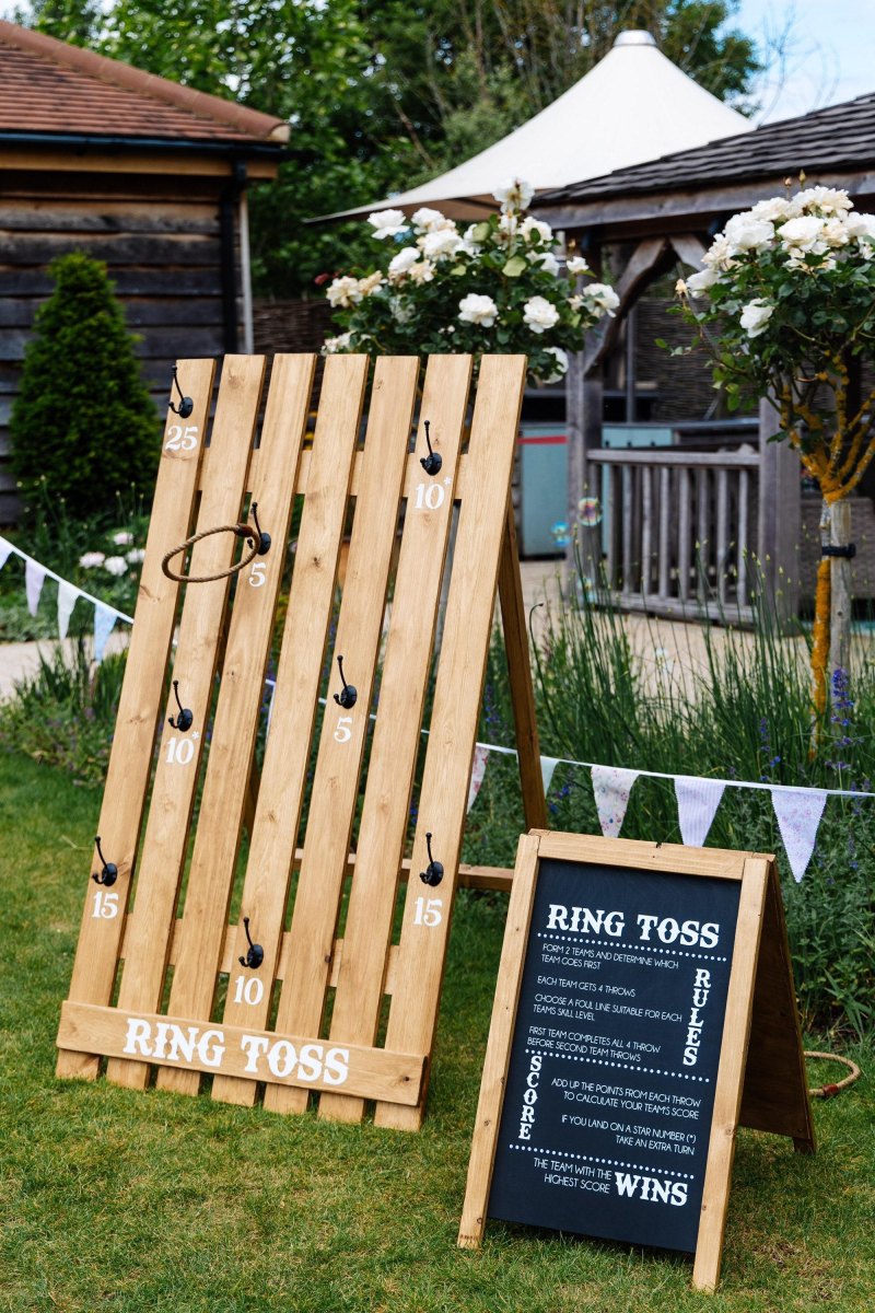 Rustic ring toss game at wedding