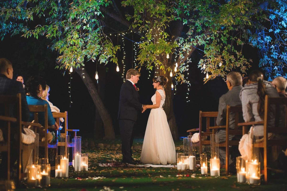 Candlelit backyard wedding ceremony