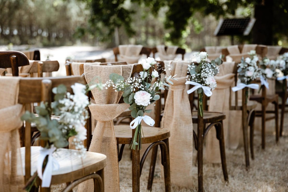Rustic decorated wedding chairs