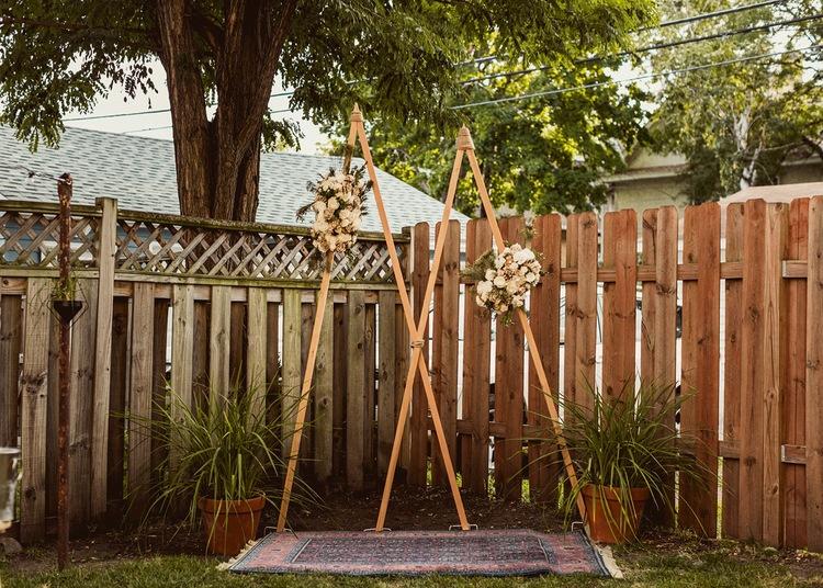 Rustic wooden altar backyard ceremony