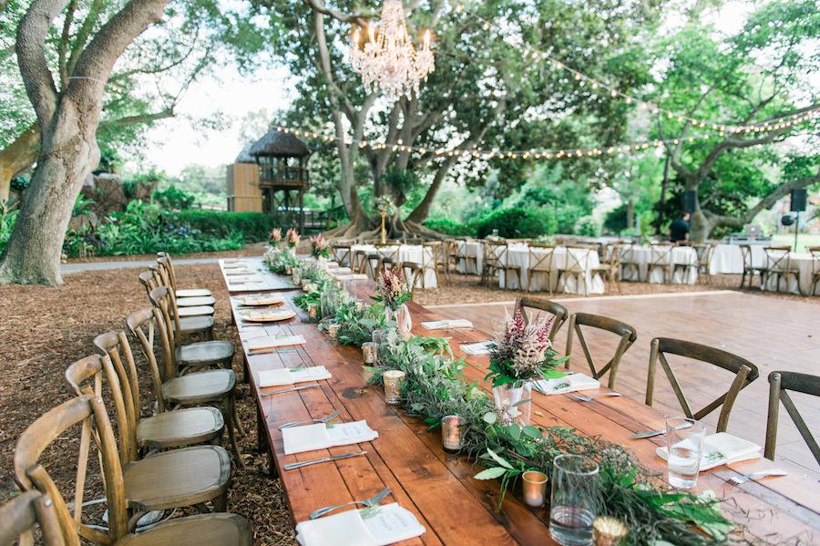 Rustic wooden decor at garden reception