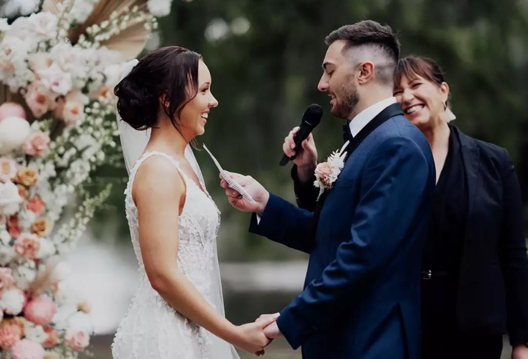 Newlywed couple smiling after vows