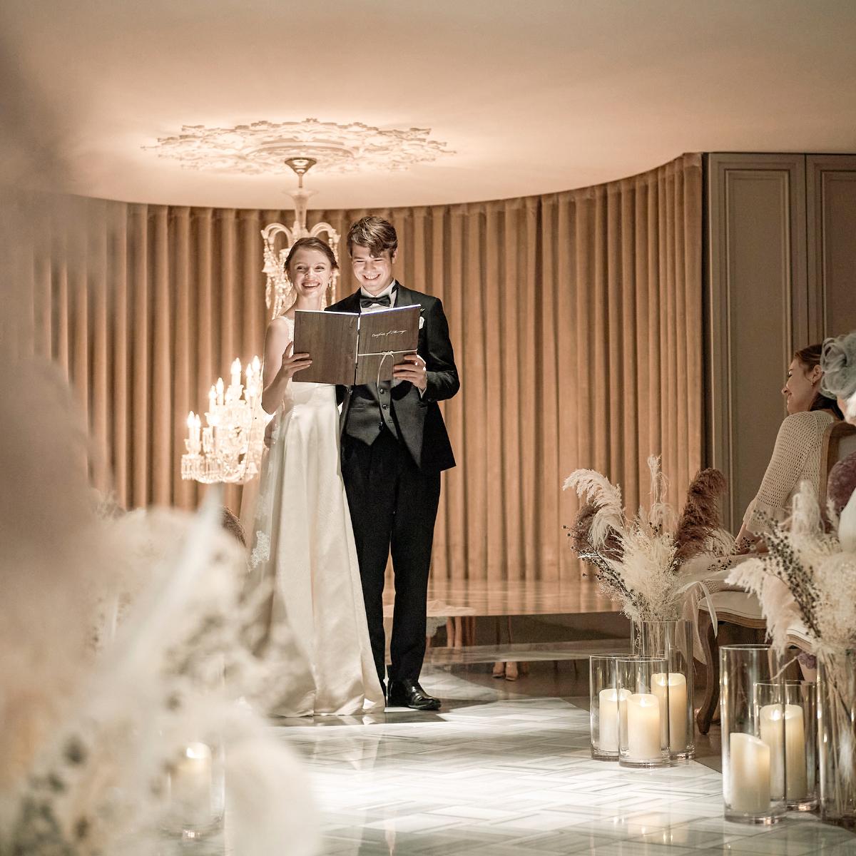 Wedding couple sharing a classic literary ceremony reading