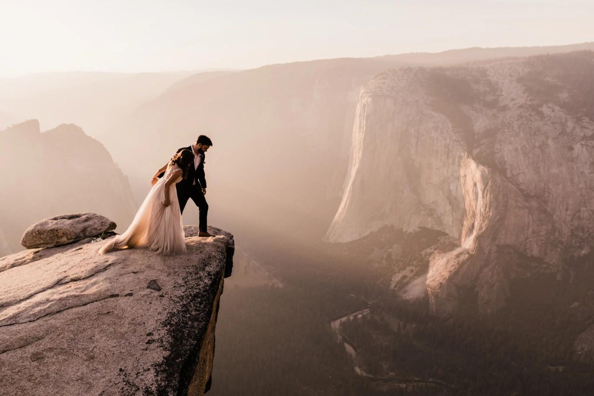 Couple silhouette on cliff for elopement photography