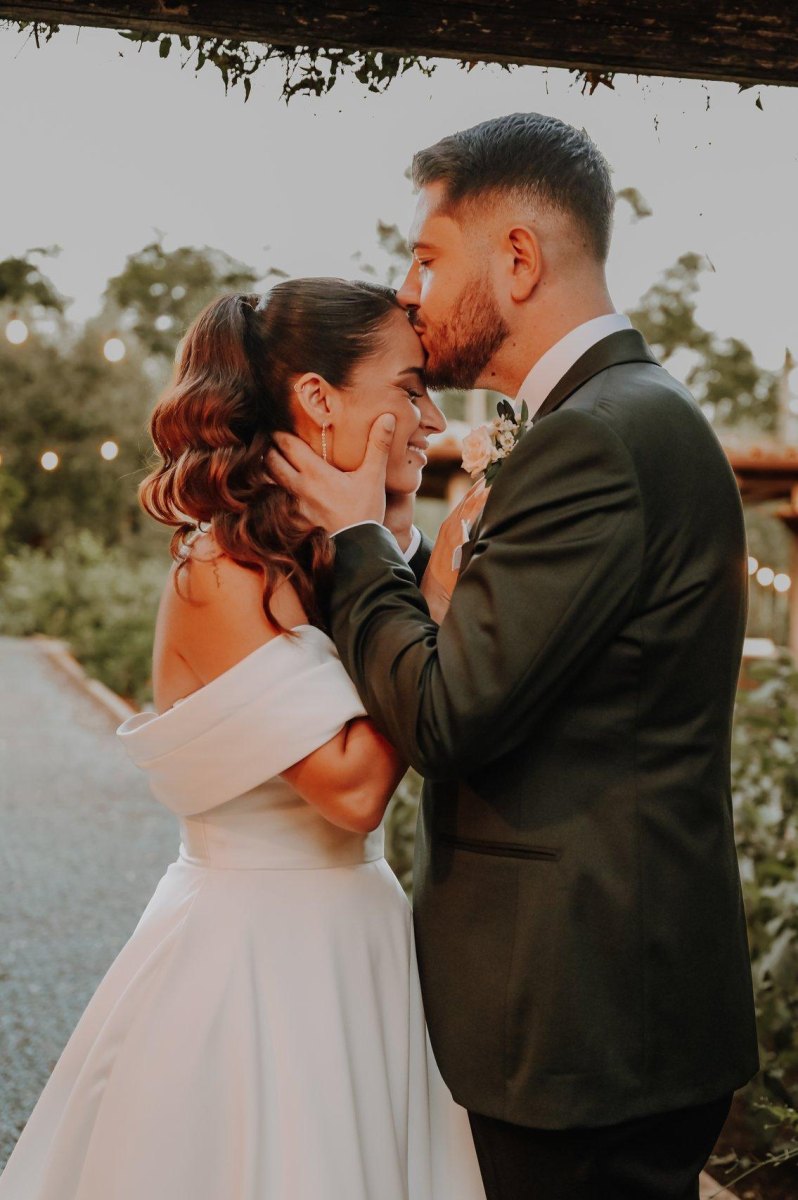 Wedding couple embracing during an intimate elopement pose