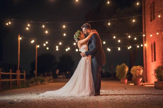 Bride and groom embracing a heartfelt ceremony reading