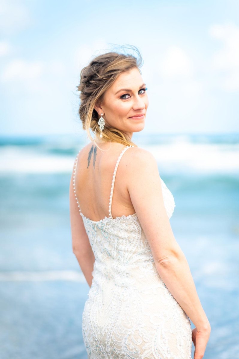 Bride portrait near ocean for elopement photography