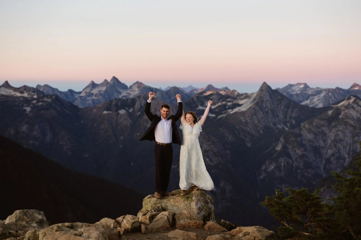 Couple in vintage car elopement photography pose