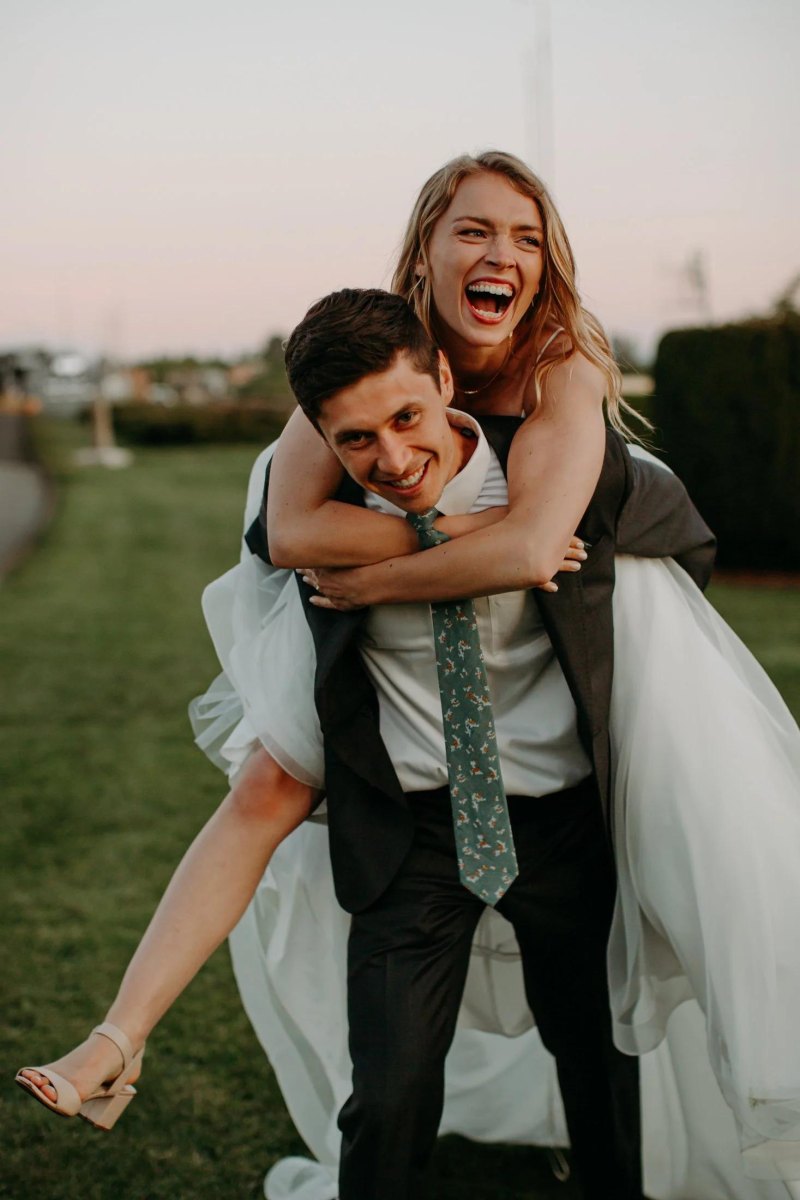 Playful piggyback wedding elopement photography pose