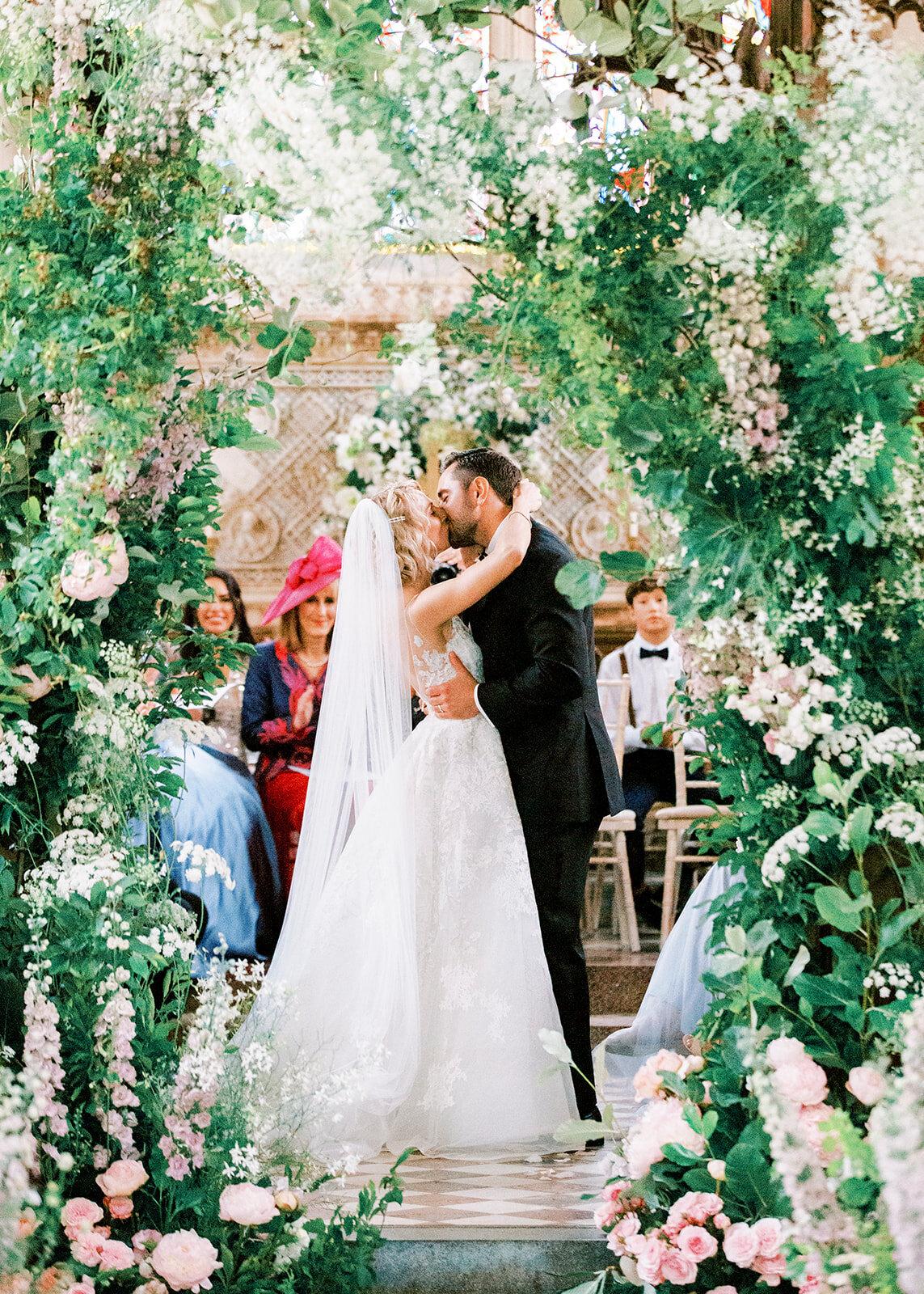 Wedding couple sharing a tender literary reading moment