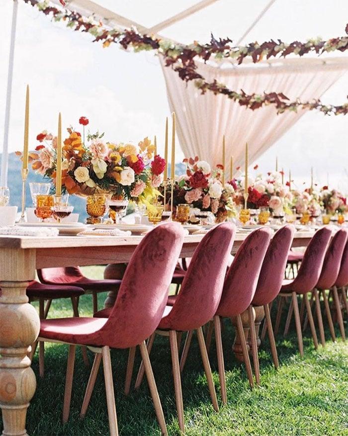 Velvet accent chairs wedding setup