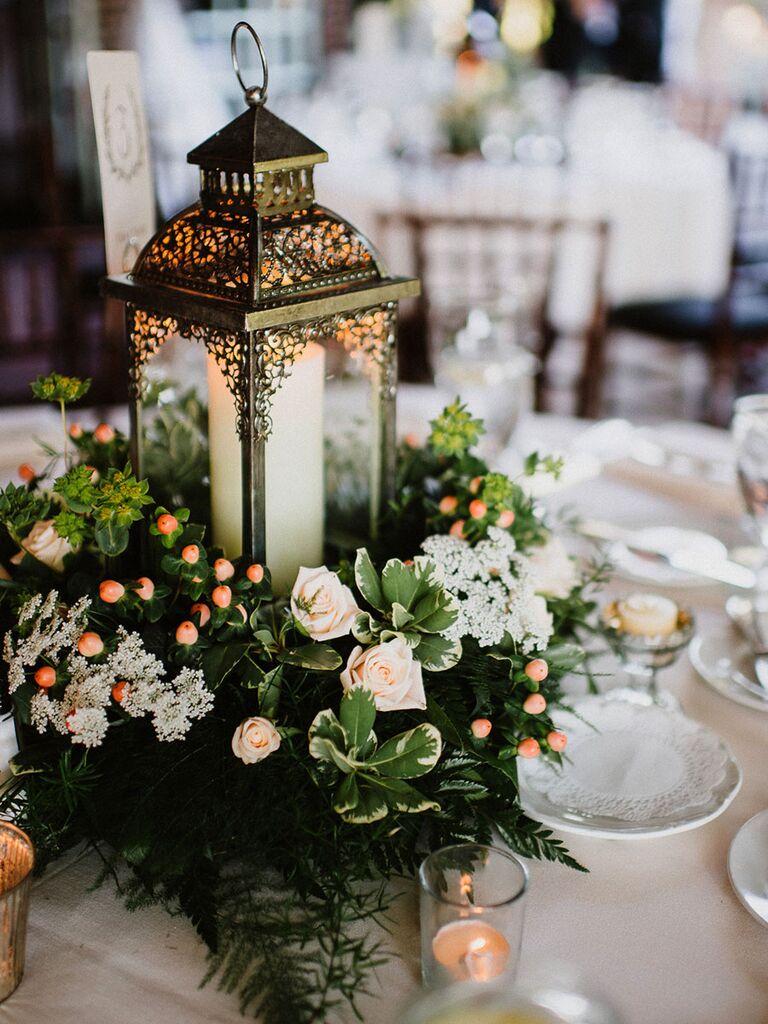 Vintage lantern with rustic wedding flowers
