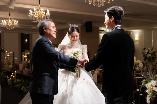 Bride welcomed by groom family