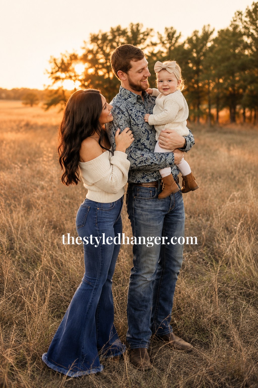 Family coordinating in cream sweater, flare jeans, and a floral shirt for western fall outfit photos